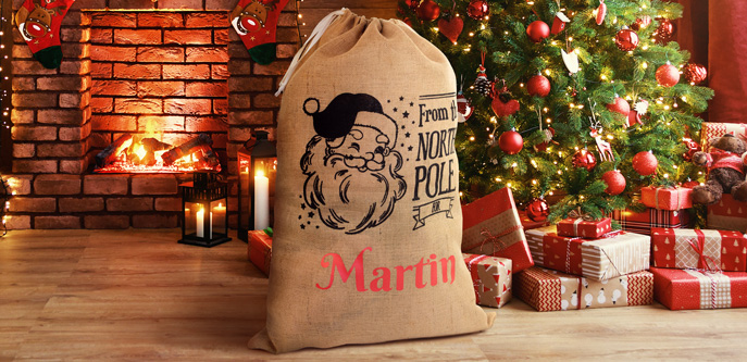 Slitta con sacco di babbo natale in juta e confetti - Mobilia Store